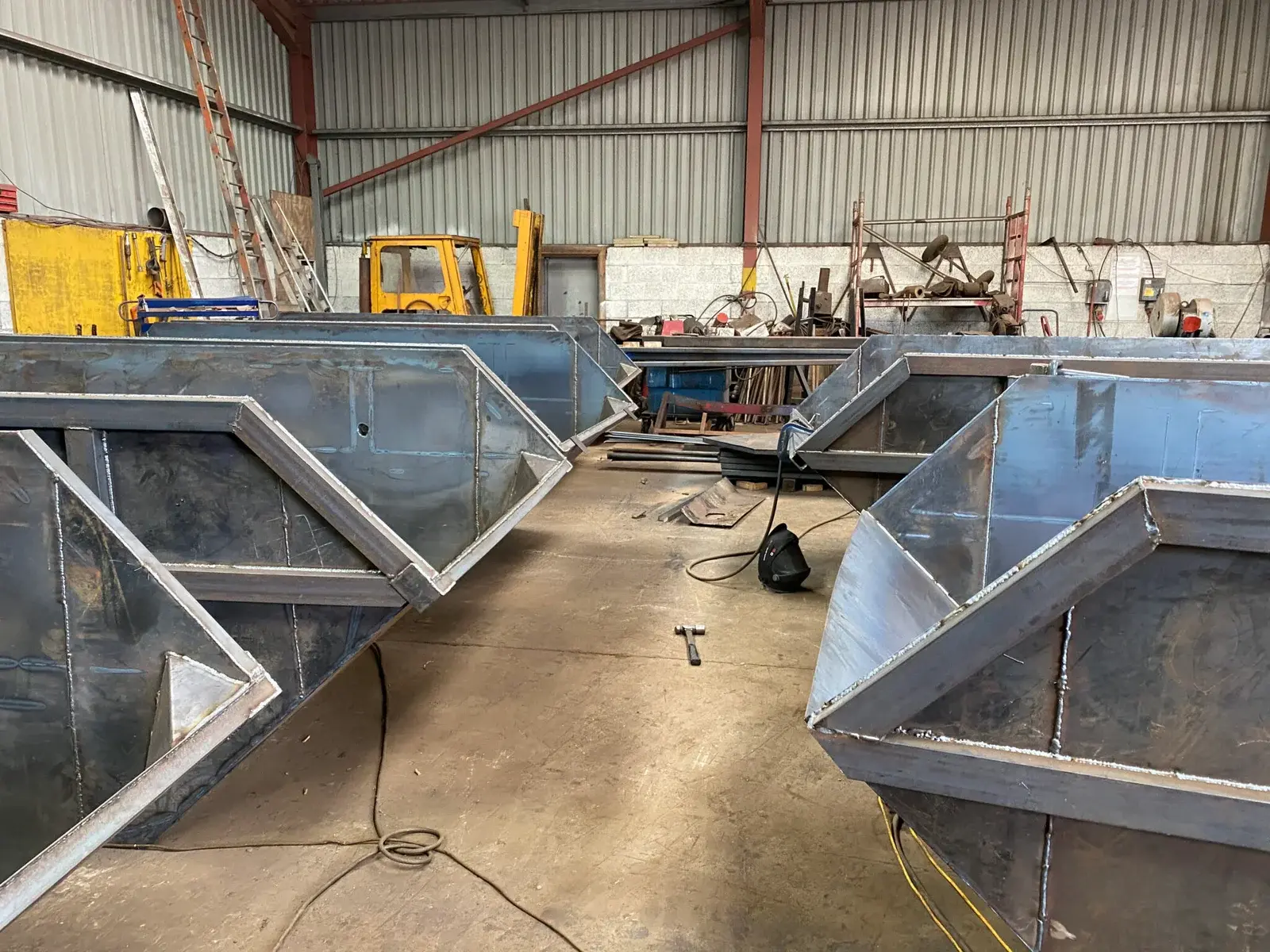 unfinished skips ready for respraying