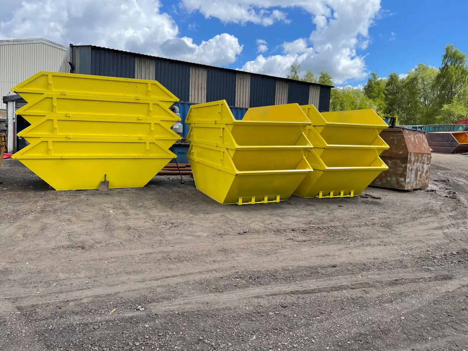 finished skips painted yellow, ready for delivery